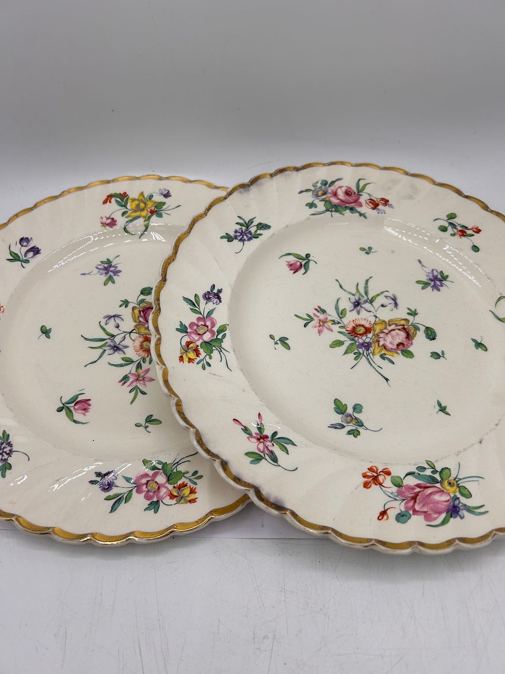 Lot 379: Pair Of Clarice Cliff Plates ,10" Diameter.