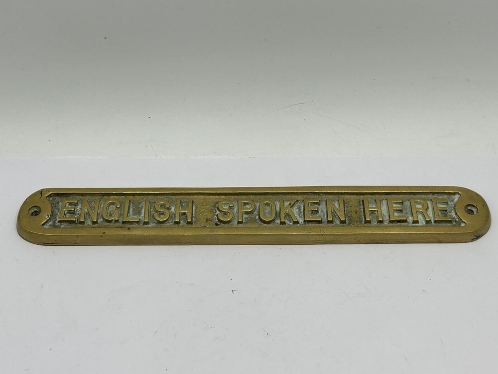 Lot 384: Brass Sign 'English Spoken Here' 9.5"