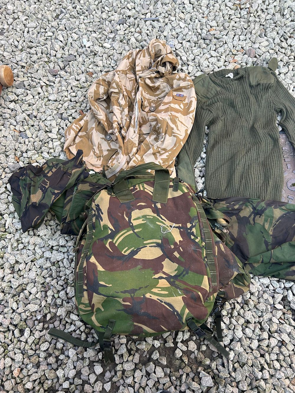 Lot 406: Military Bag With Camouflage Clothing.
