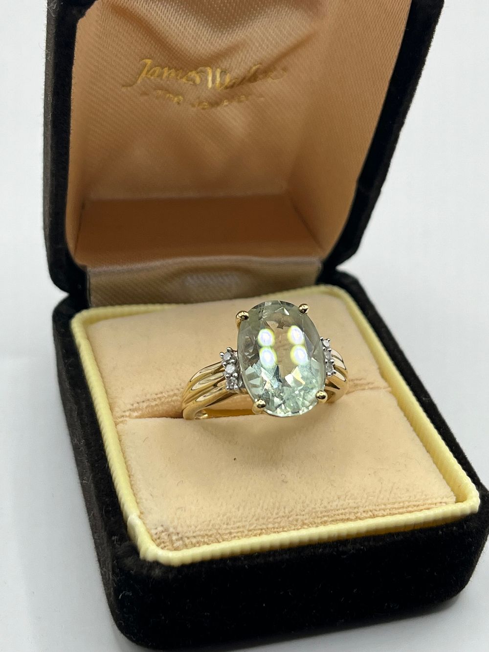 Lot 313: 9ct Oval Green Quartz & Diamond Accent Ring,...