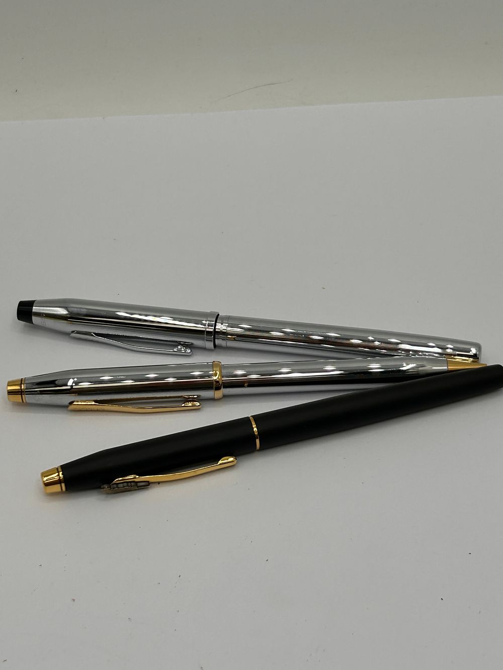 Lot 354: Two Cross Fountain Pens Plus Cross Pencil.