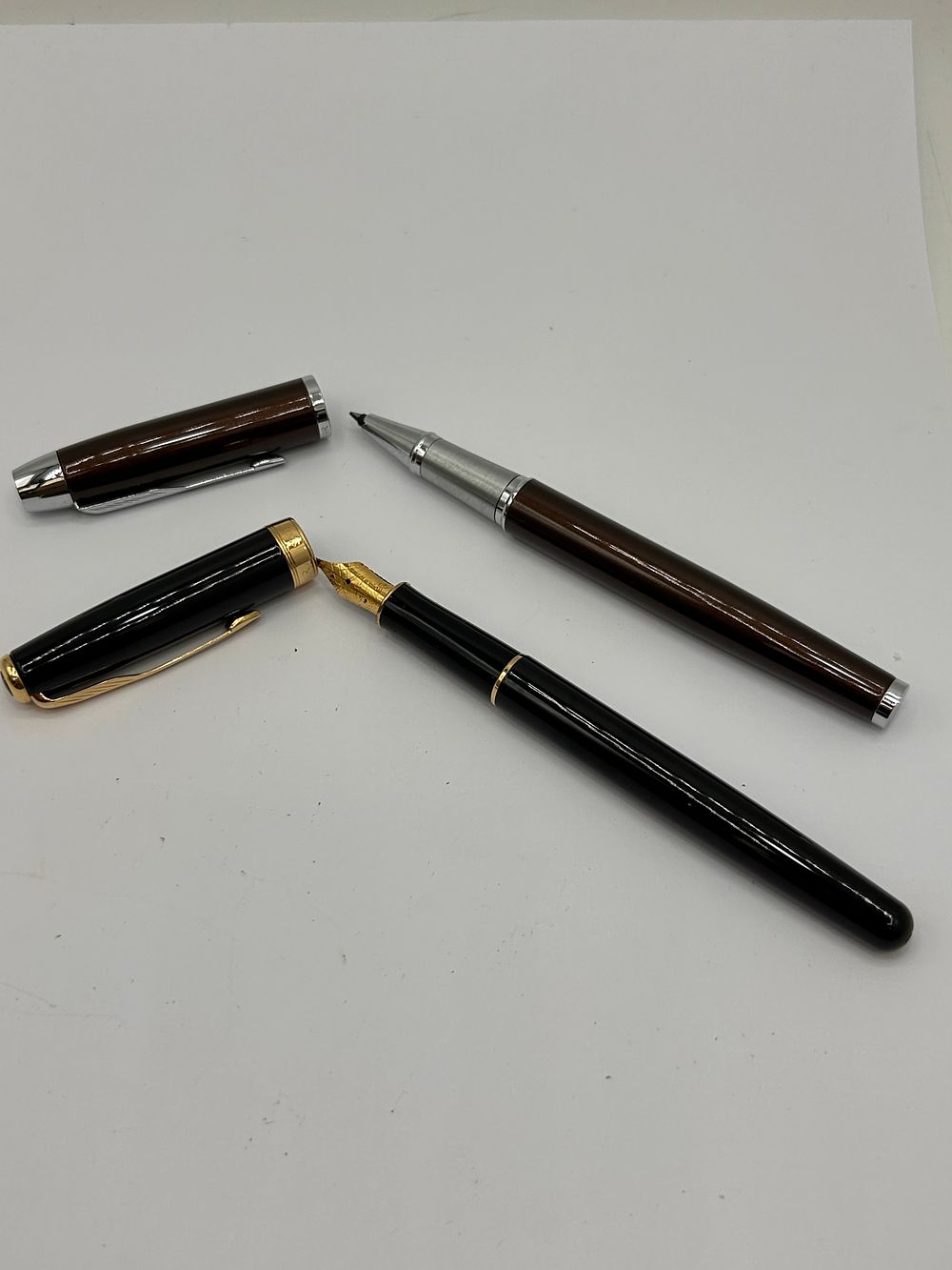 Lot 364: Parker Fountain Pen In Black Plus Parker Roller...