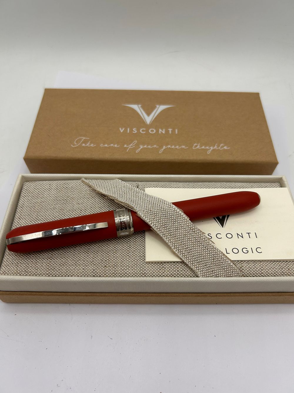 Lot 369: Boxed With Papers Visconti Eco-Logic Rollerball In Red.