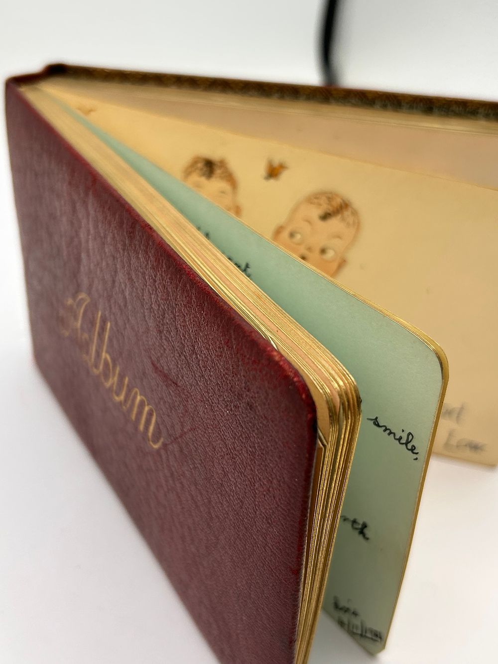 Lot 358: An Antique Autograph and Scrapbook Album with Original Illustrations and Handwritten Entries