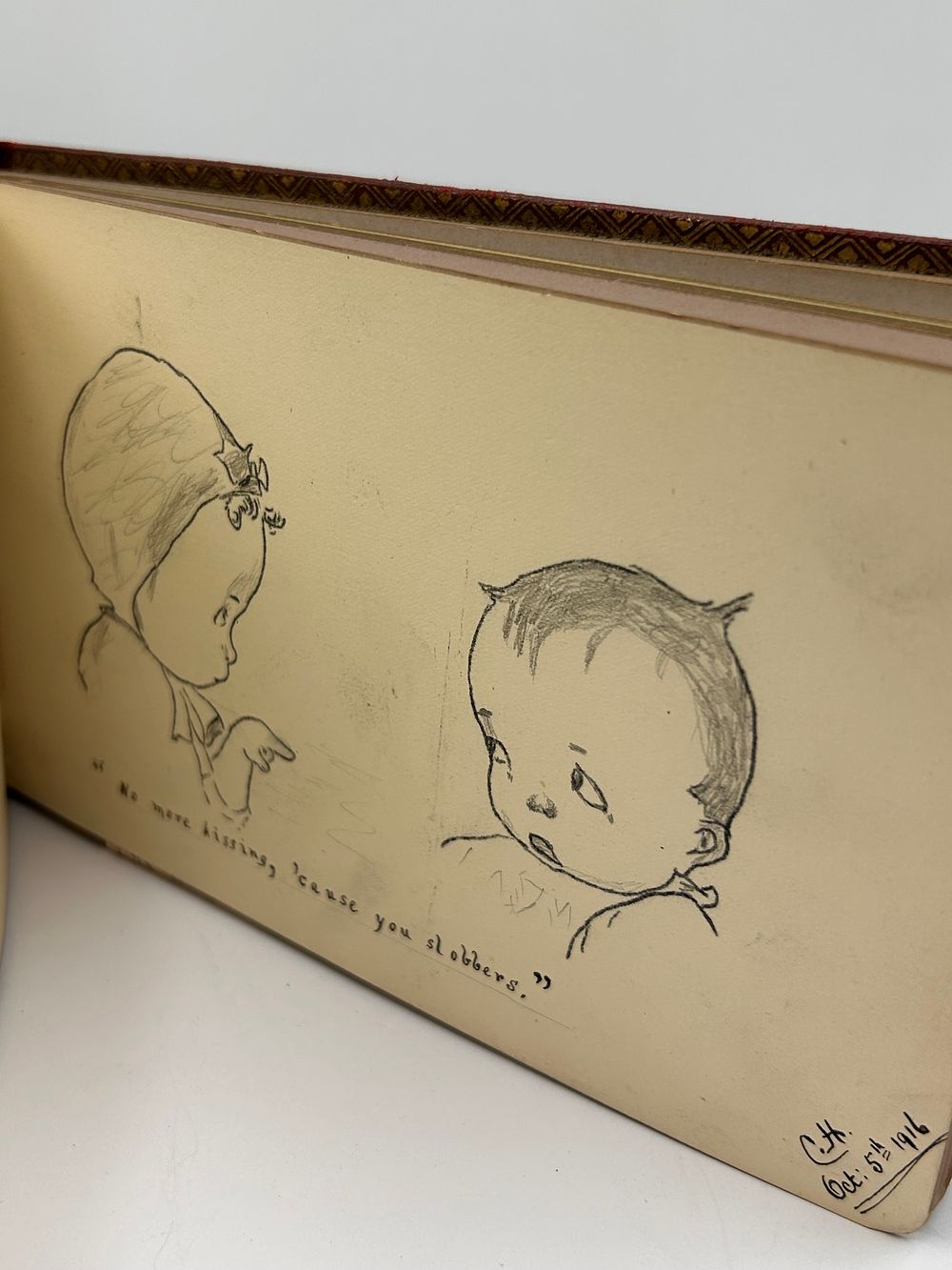 Lot 360: Early 20th Century Album or Scrapbook, 1916, Featuring Original Drawings Including Art Nouveau and Baby Figures