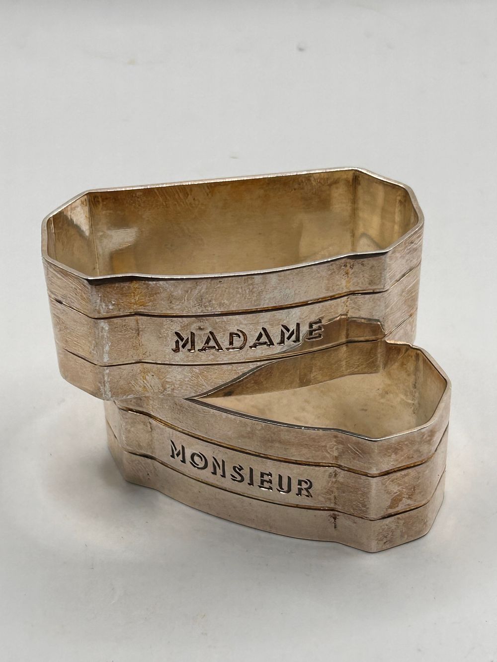 Lot 397: A Pair of Art Deco Madame & Monsieur Silverplate ? Silver ?Napkin Rings