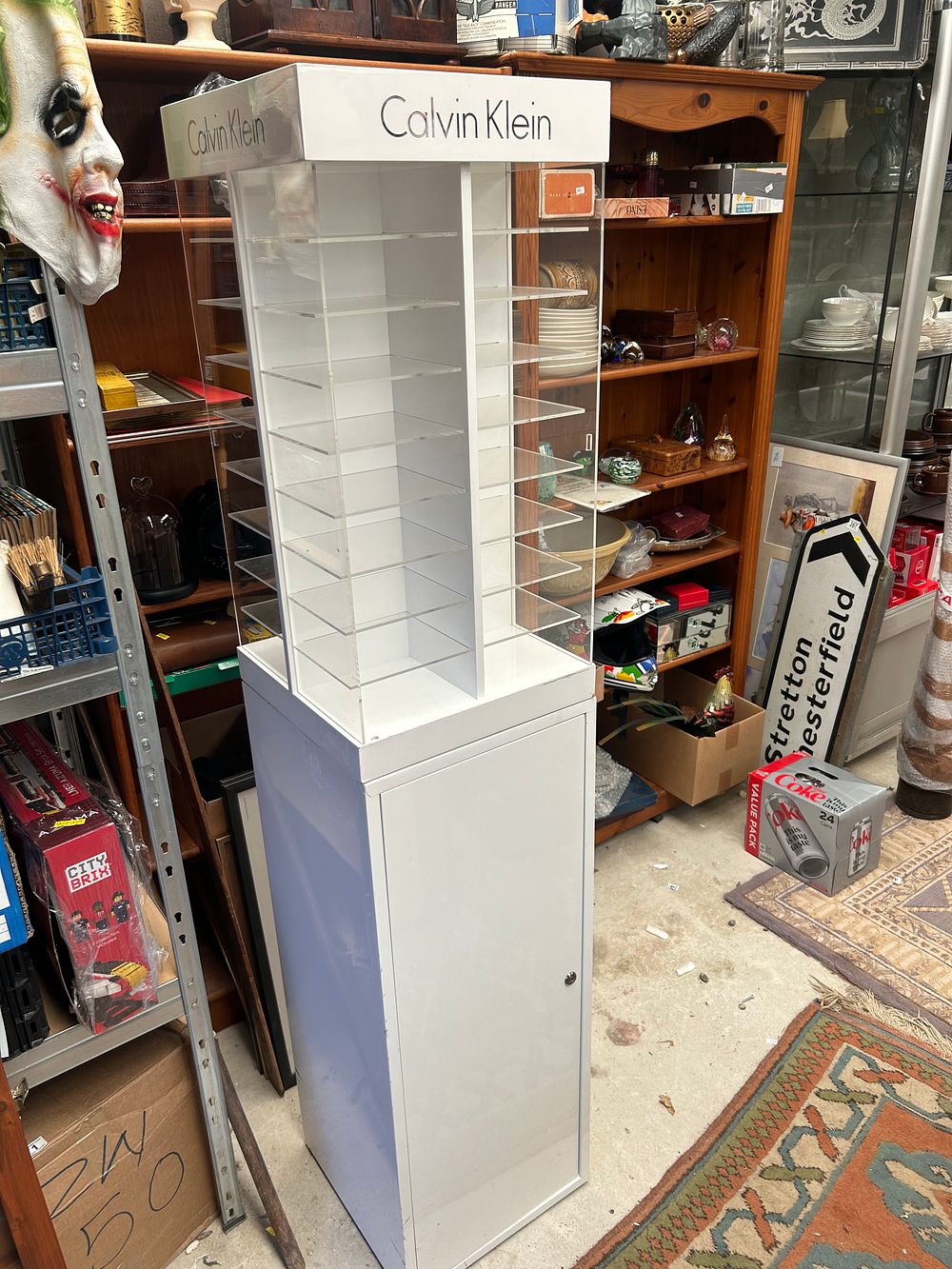 Lot 428: A Contemporary Calvin Klein Branded Retail Display Unit, 66.5” Tall