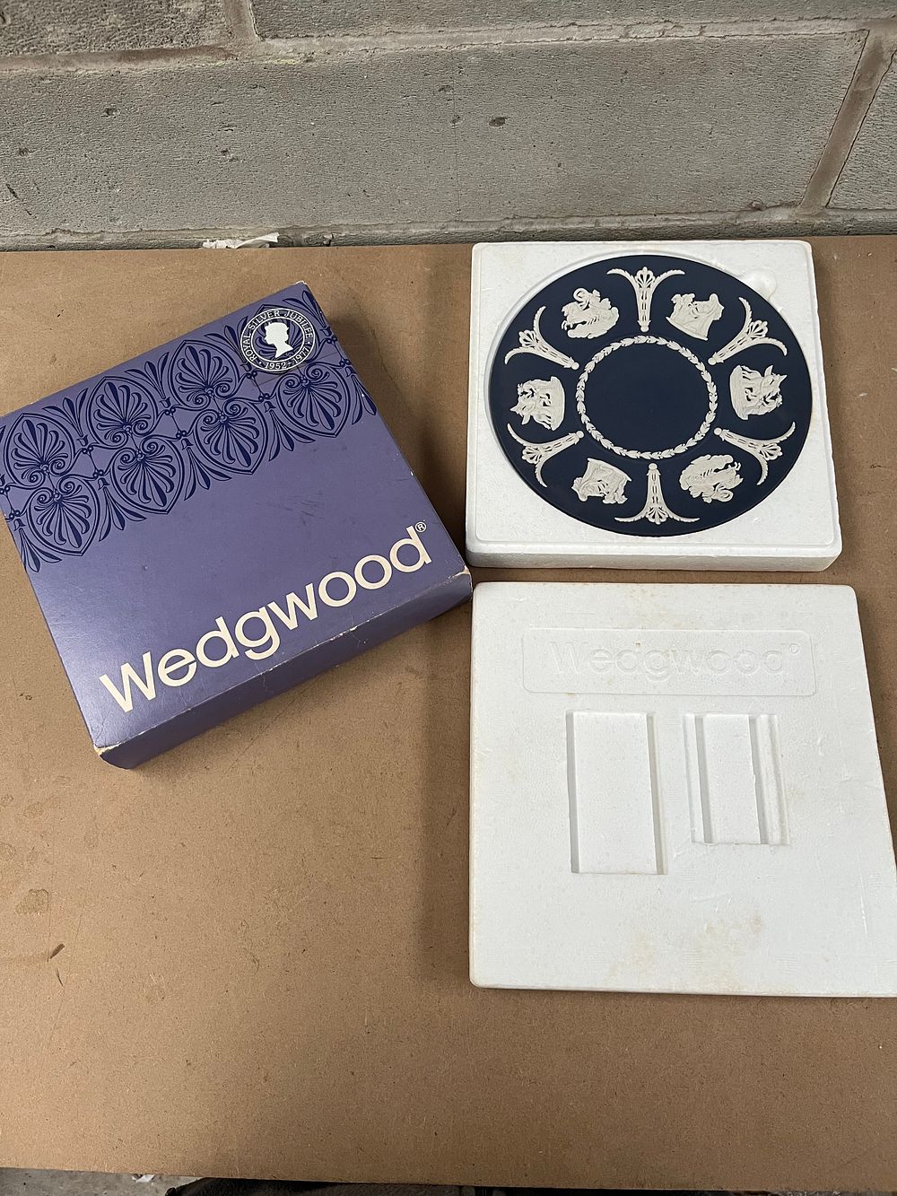 Lot 458: Wedgwood Jasperware Dark Blue Plate with Neoclassical Relief in Original Box