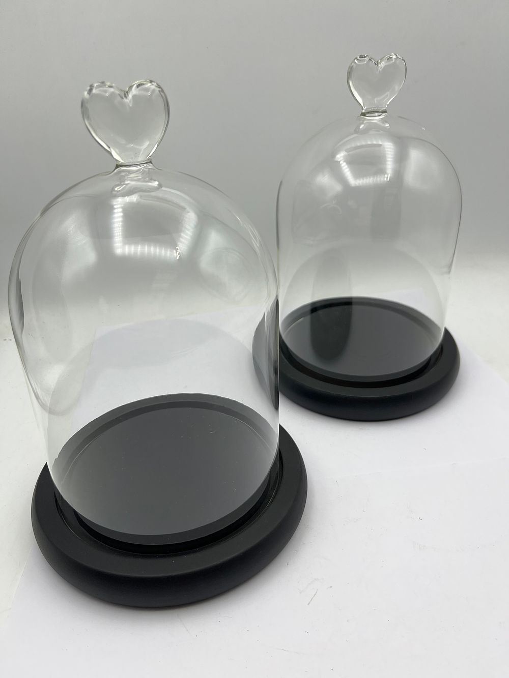 Lot 464: A Pair of Plymor 5.5" x 8" Glass Display Dome Cloches with Heart-Shaped Finials