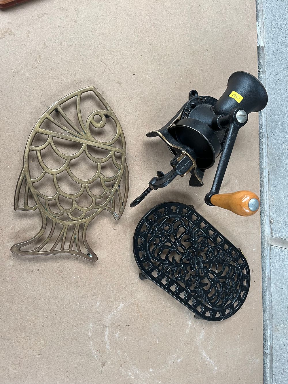 Lot 465: Three Vintage Kitchen Accessories, including a Spong & Co. Cast Iron Coffee Grinder