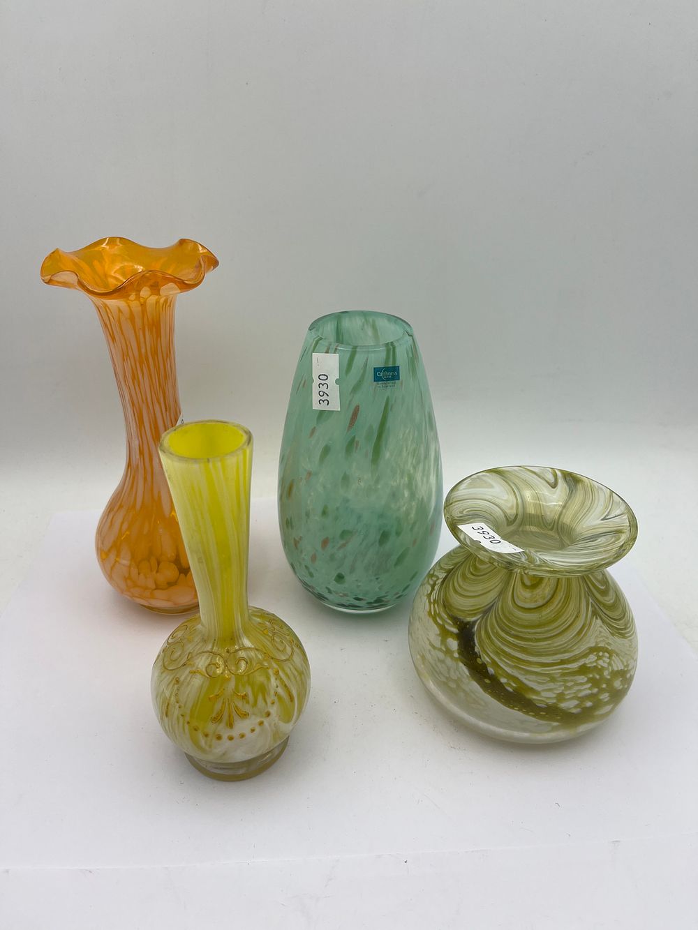 Lot 468: A Collection of Four Glass Vases, Including One Caithness Tallest 6”