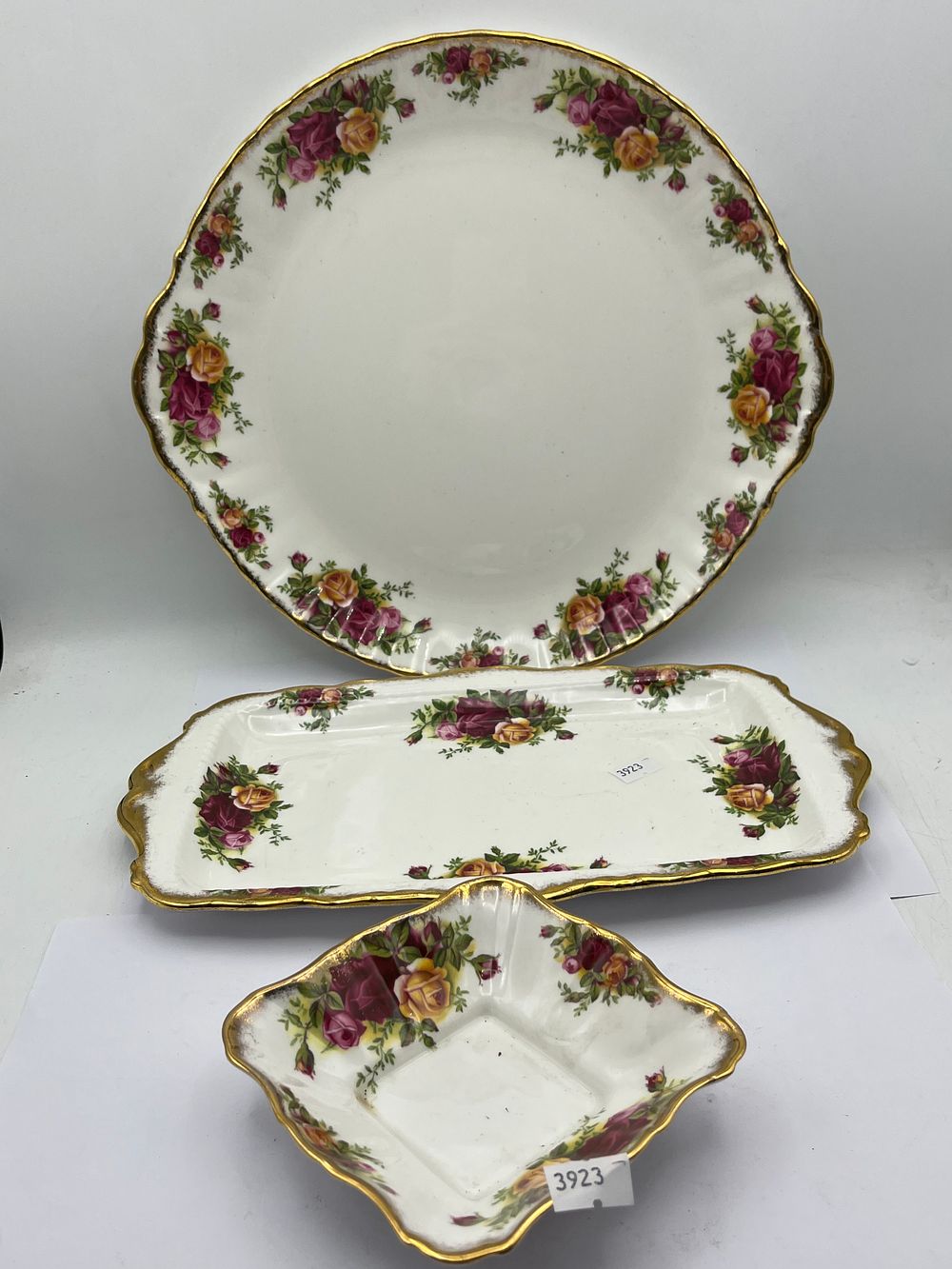 Lot 475: Three Pieces of Royal Albert Old Country Roses Bone China Tableware, including a 12” Diameter Cake Plate