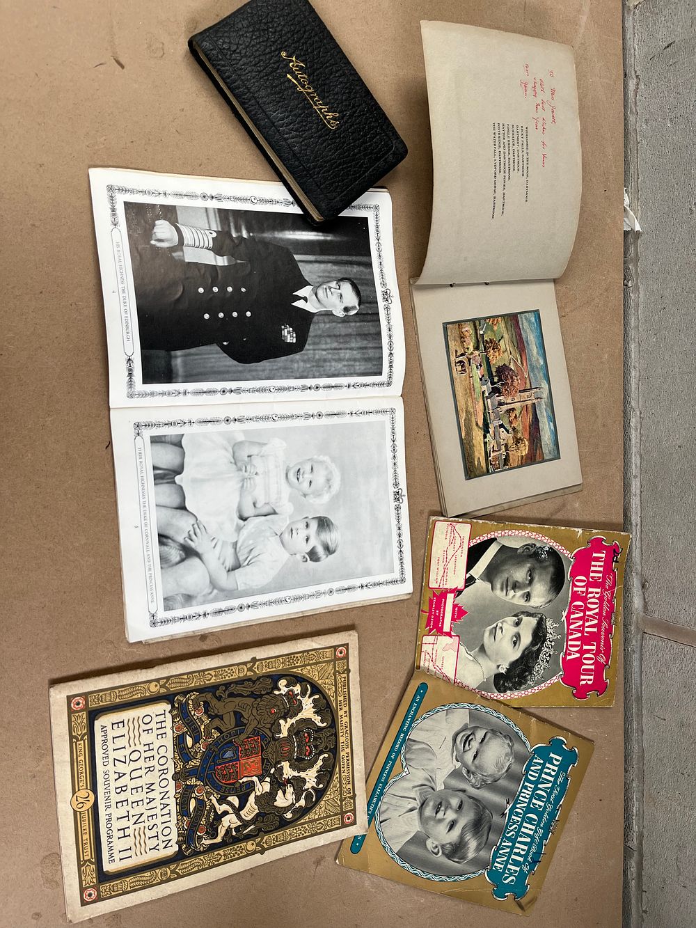 Lot 479: A Collection of Mid-20th Century British Royal Family Commemorative Programmes, including Queen Elizabeth II's Coronation, and a Vintage Autograph Book