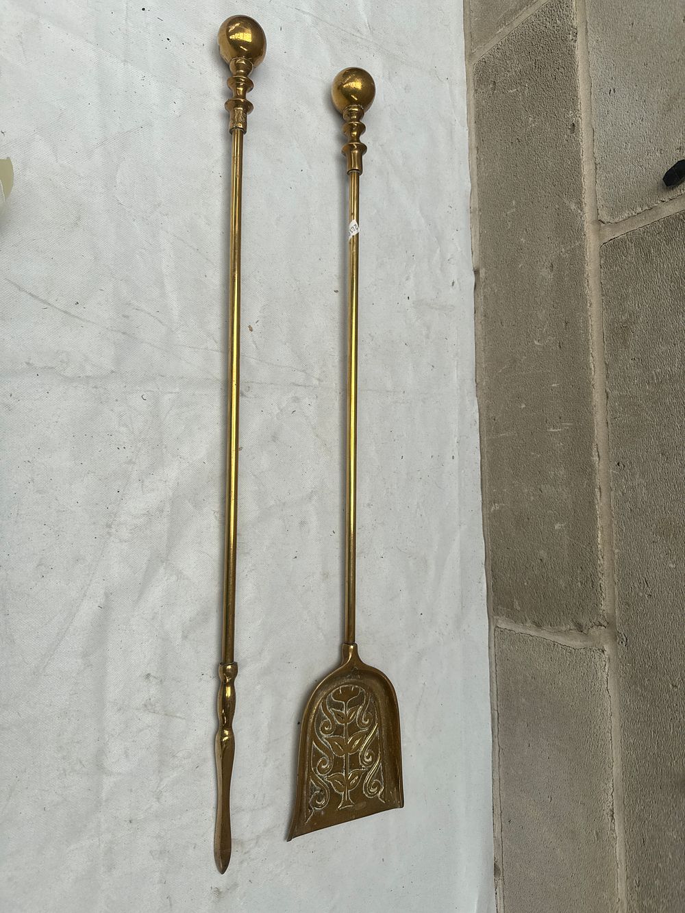 Lot 533: A Pair of Victorian Brass Fireplace Tools