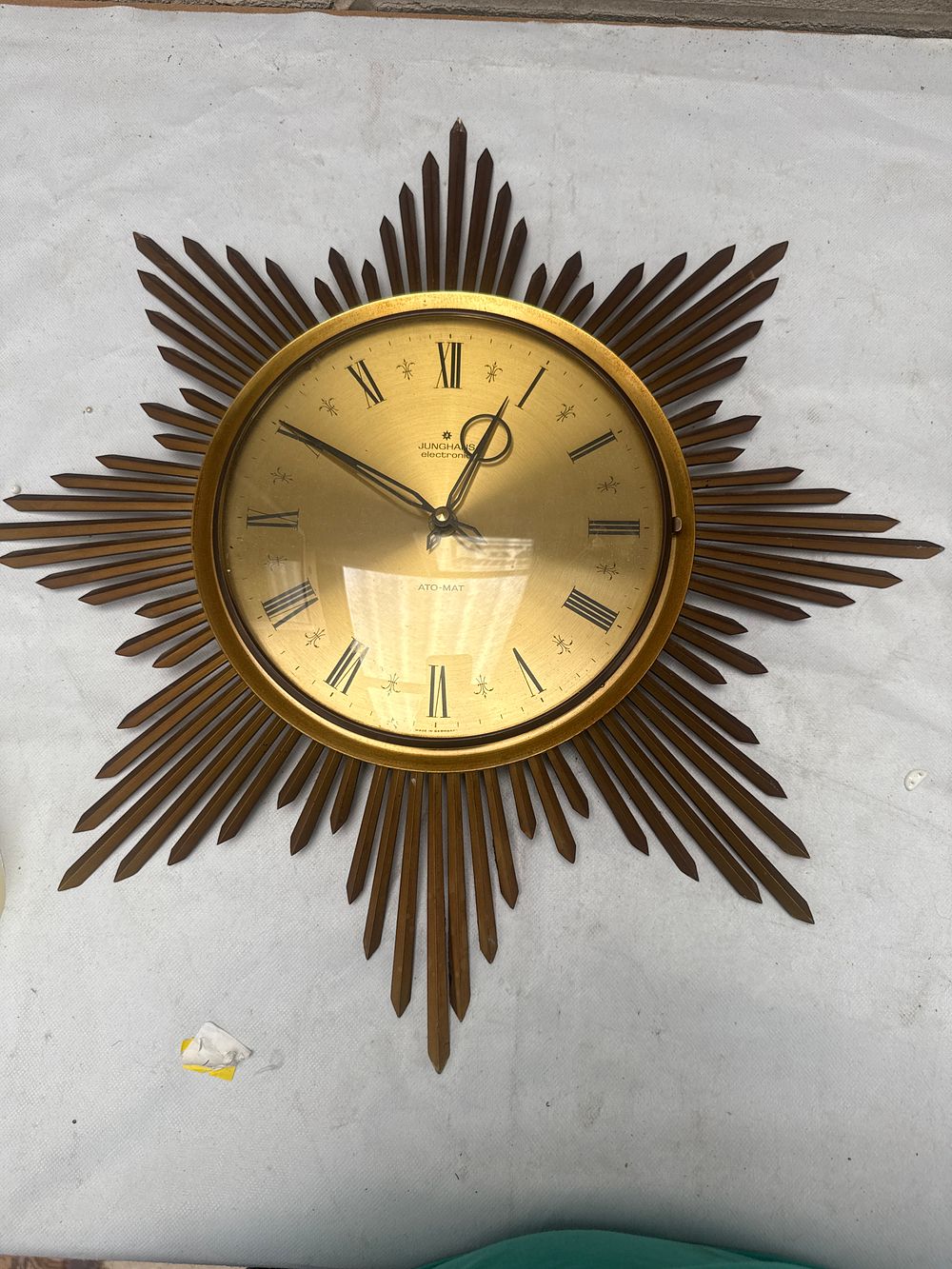 Lot 541: A Junghans Ato-Mat Sunburst Wall Clock, Mid-20th Century