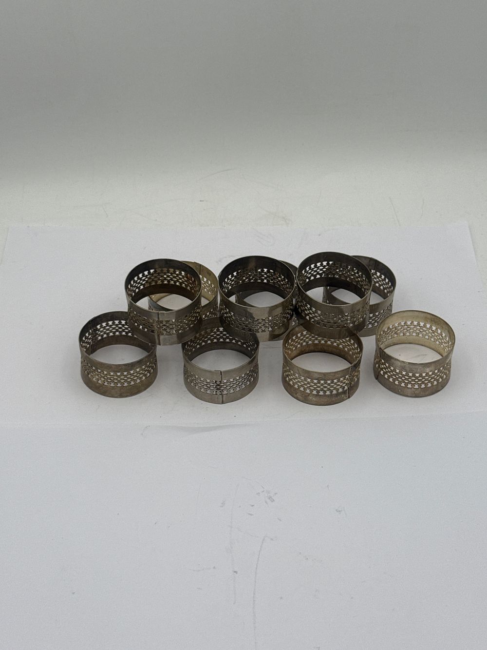 Lot 558: A Set of Ten Brutalist Style Metal Napkin Rings