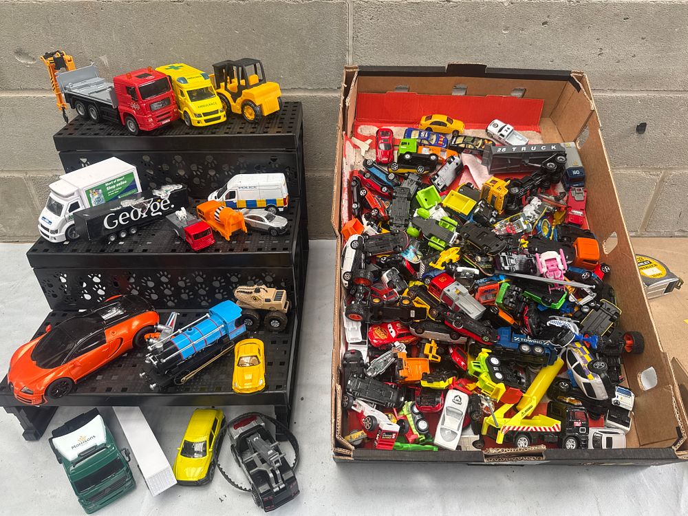 Lot 570: A Large Collection of Hot Wheels and Other Die-Cast Toy Vehicles, Approximately 100-150 Examples