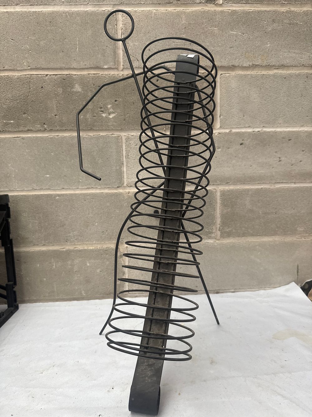 Lot 571: A Mid-Century Modern Style Abstract Metal Freestanding Media Holder with Figure, 26 Inches