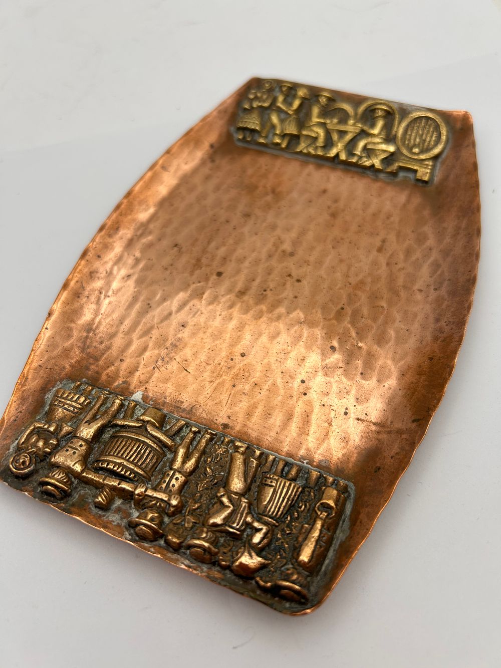 Lot 590: Mid-20th Century Israeli Hammered Copper Ashtray or Dish with Applied Bronze Judaica Reliefs