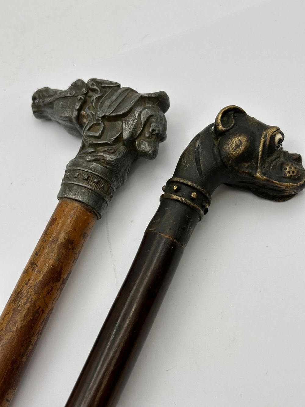 Lot 597: A Pair of Antique Cast Metal Figural Walking Sticks, comprising a Horse Head and a Bulldog Handle