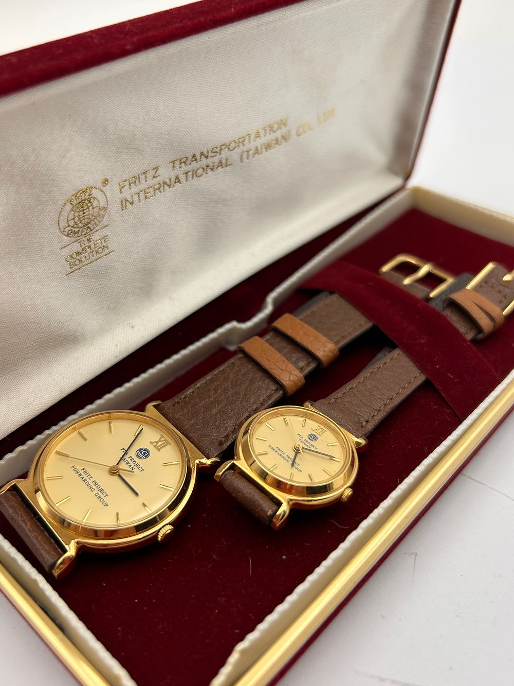 Lot 600: A Pair ICI of Fritz Project Forwarding Group Gold-Tone Quartz Wristwatches, in Presentation Box