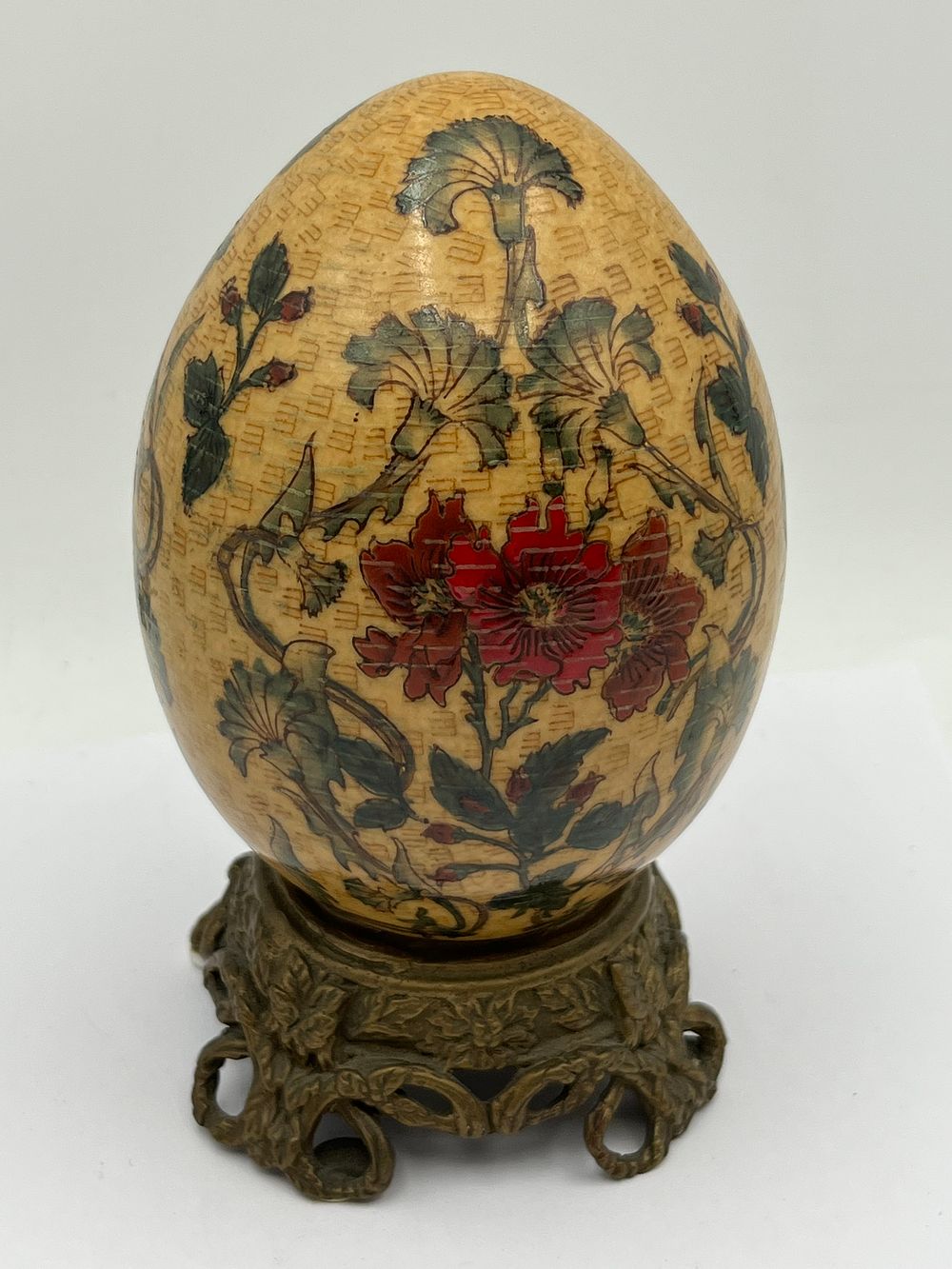 Lot 604: A Hand-Painted Satsuma Porcelain Decorative Egg with Metal Stand