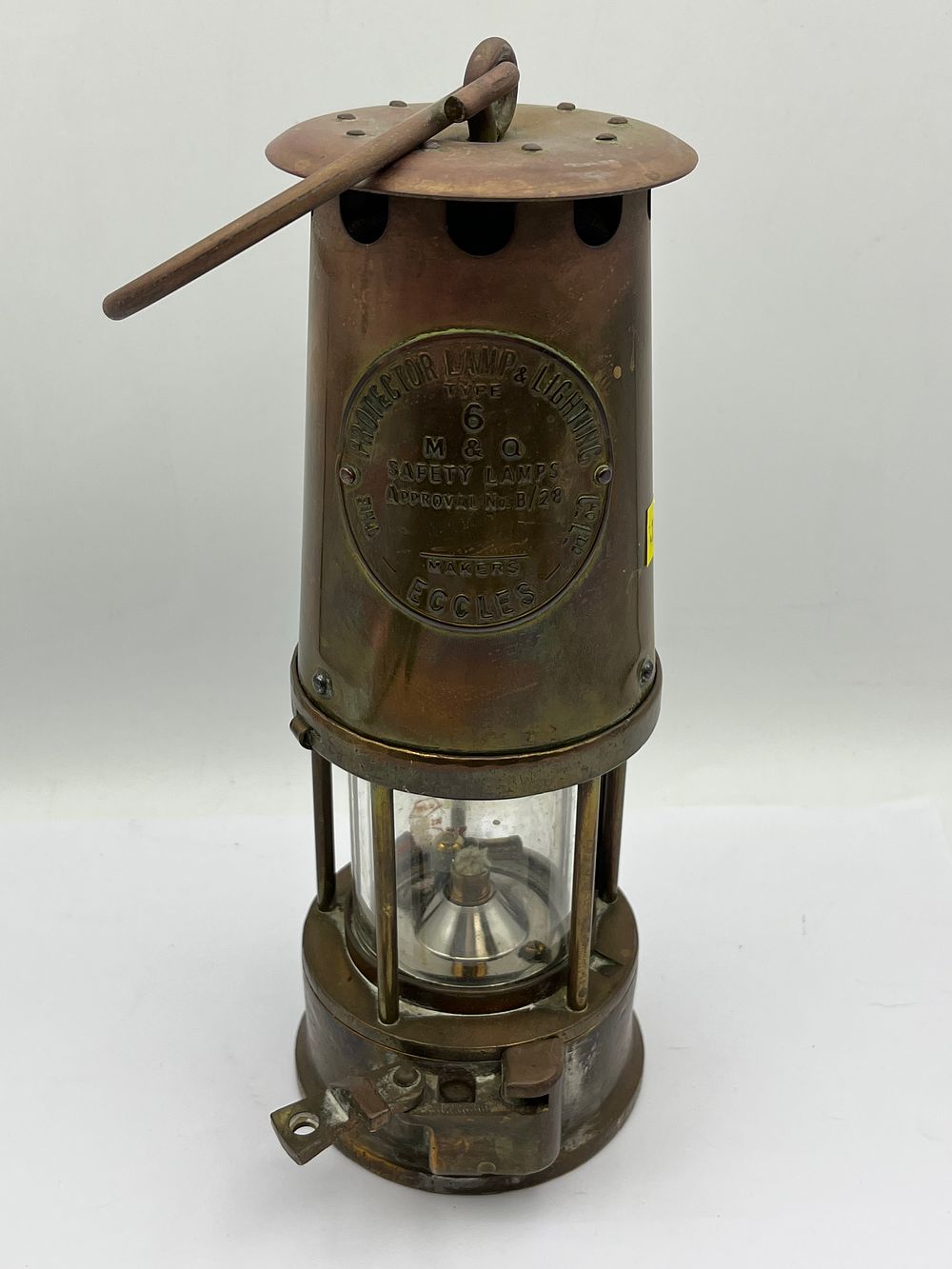 Lot 609: A Protector Lamp & Lighting Co. Ltd. Eccles Type 6 M&Q Safety Miners Lamp, 9” Tall
