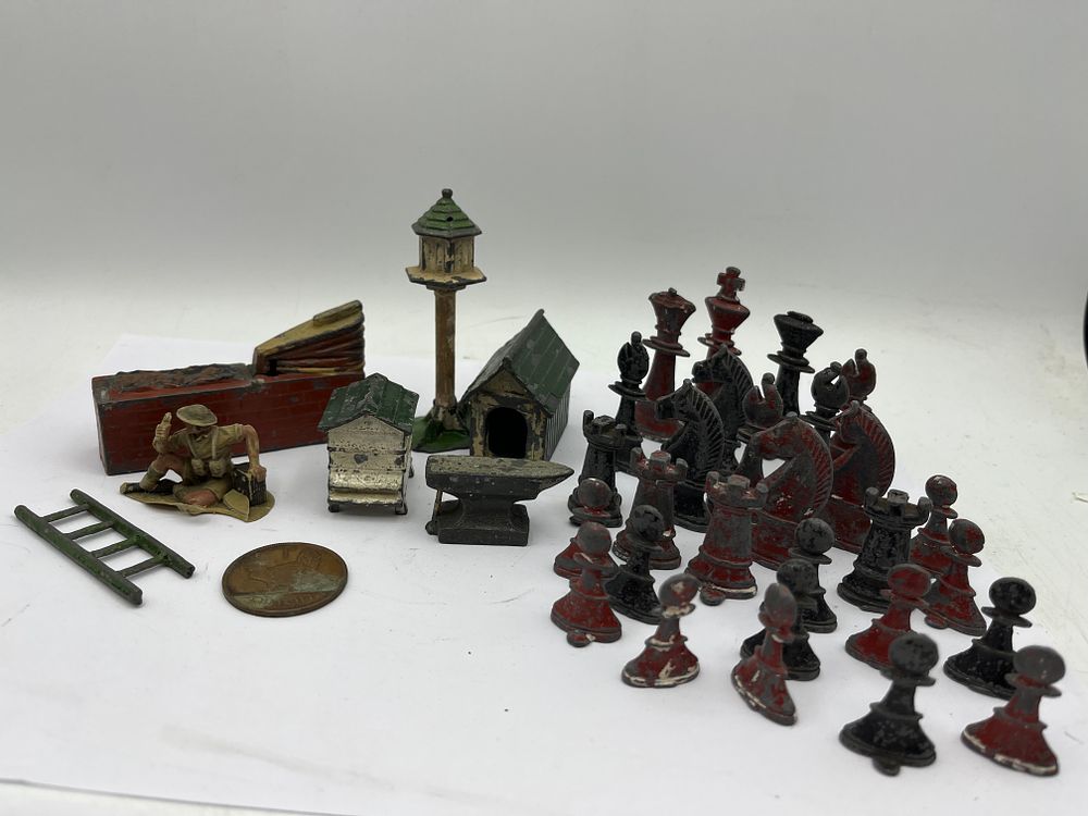 Lot 622: A Collection of Vintage Painted Cast Metal Miniatures, Tallest 3 inches