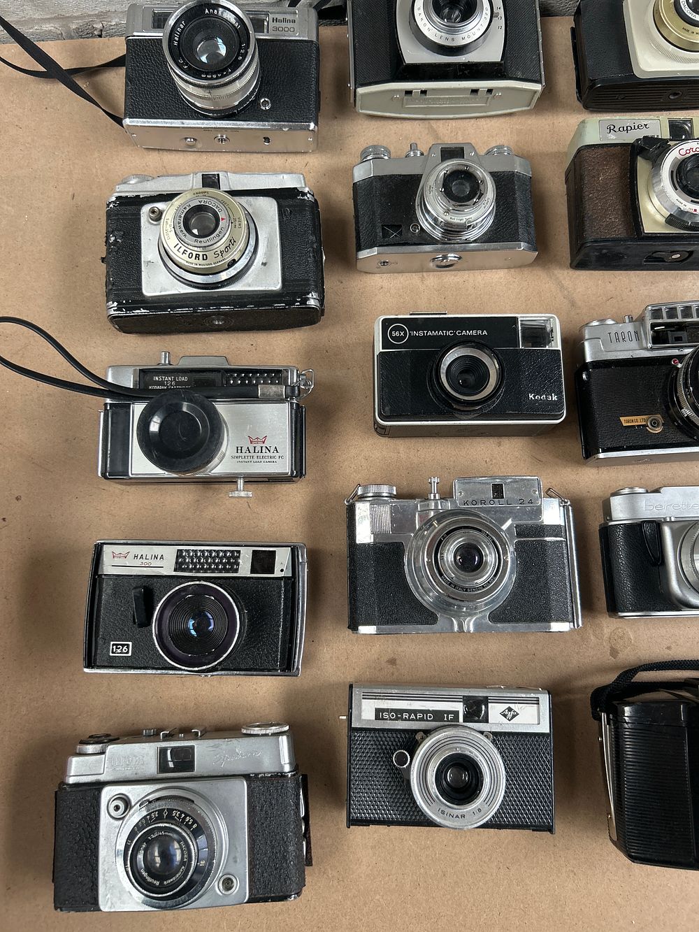 Lot 633: A Collection of Approximately 24 Vintage Film Cameras, including Kodak Instamatic, Not Tested