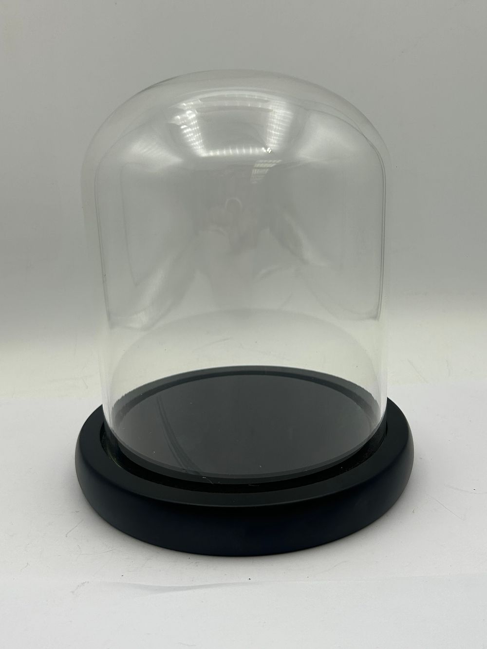 Lot 642: A Contemporary Glass Display Cloche with Black Base, 7” Tall