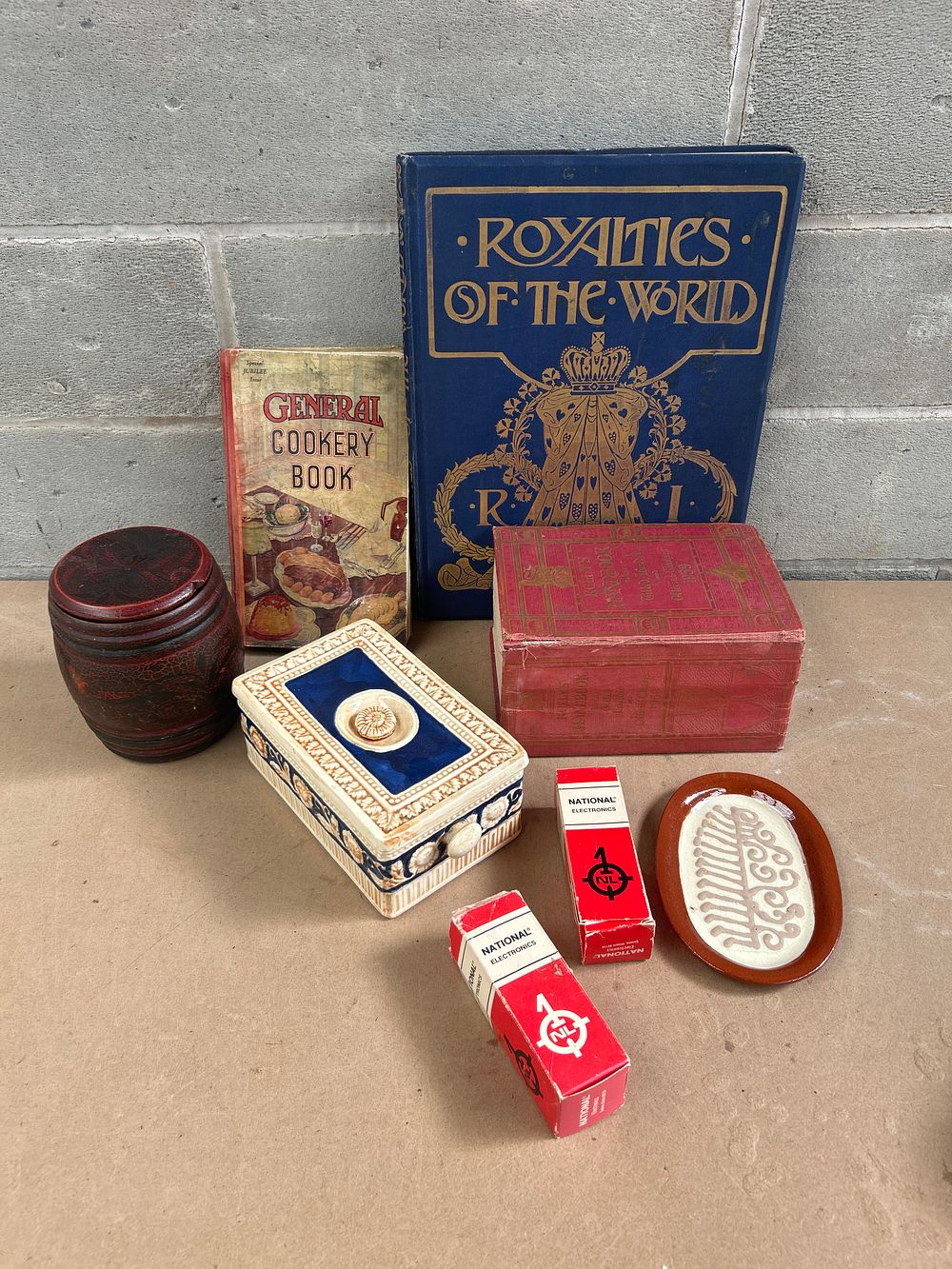Lot 648: A Collection of Books and Decorative Objects, including 'Royalties of the World' by Rudolf De Cordova
