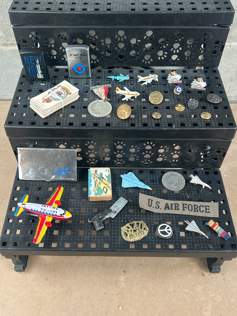 Lot 670: A Collection of Aviation and Military Memorabilia on a Challenge Coin Display Unit