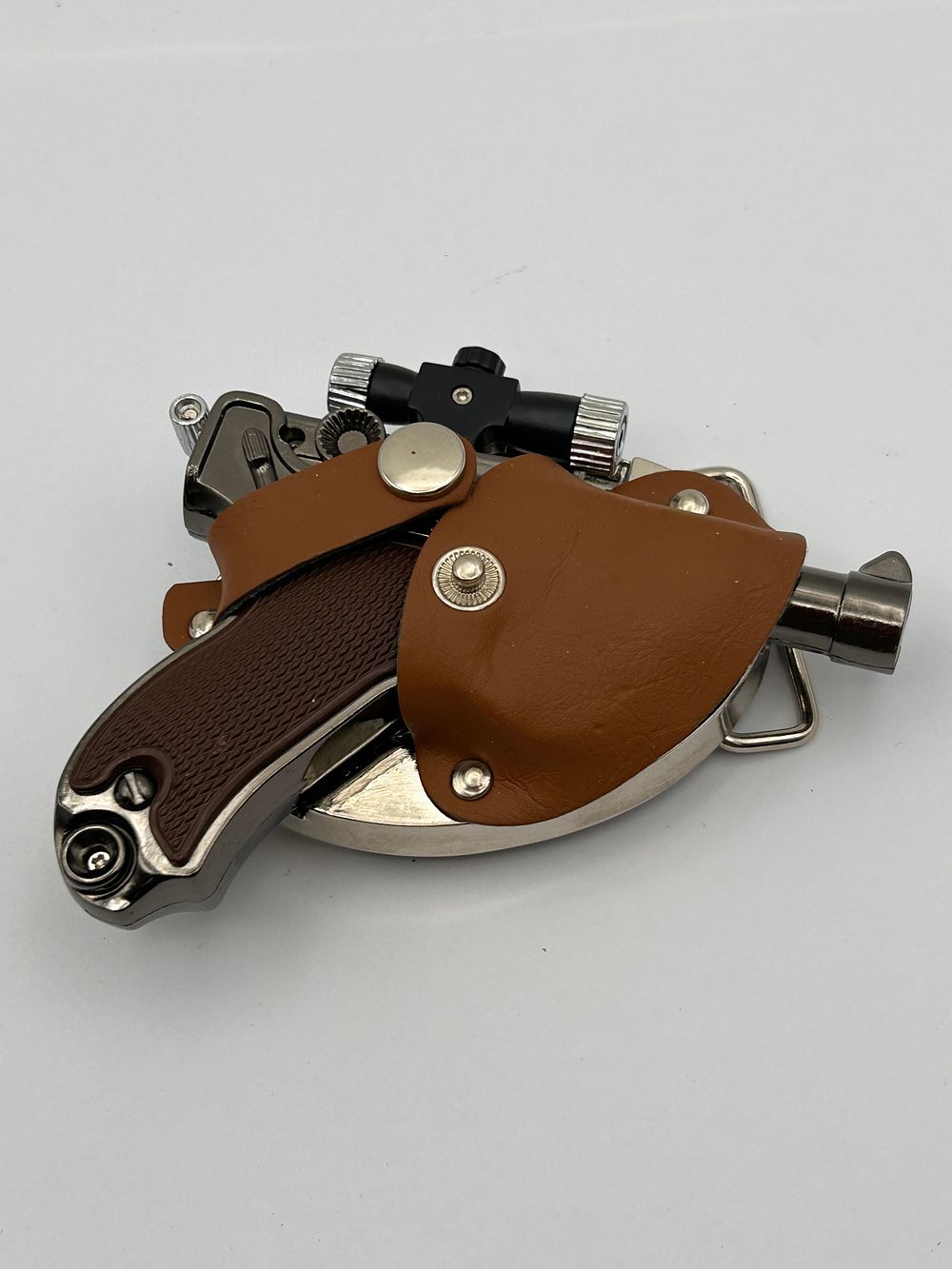 Lot 198: A Snub Nose Revolver Pistol Jet Lighter Belt Buckle