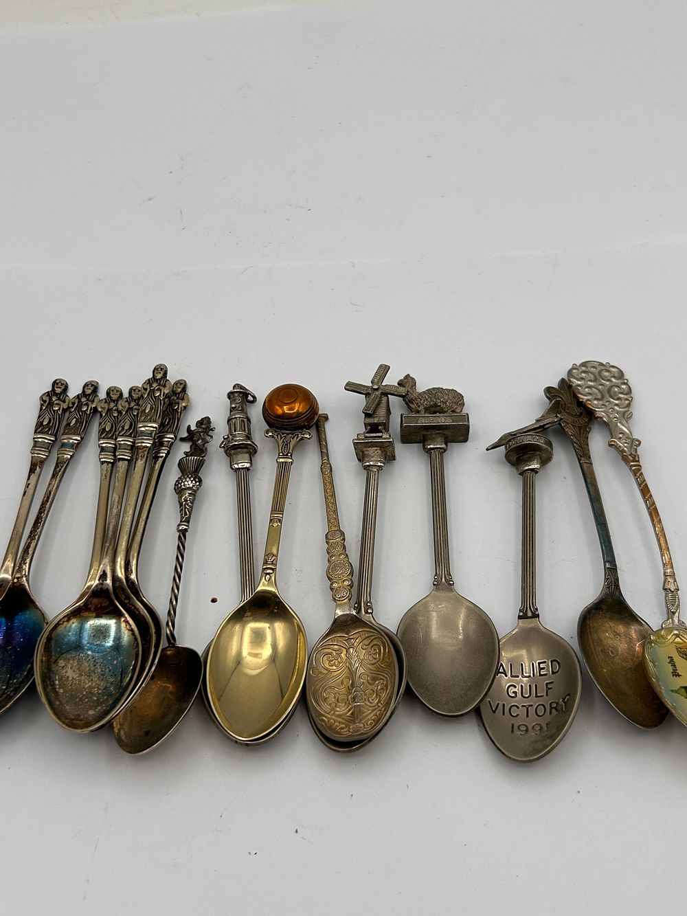 Lot 241: A Group of Assorted Silver and Silver-Plated Souvenir Spoons