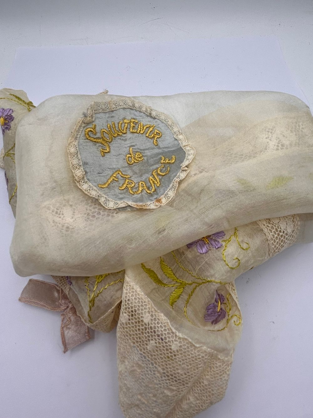 Lot 243: A Vintage Hand-Embroidered 'Souvenir de France' Souvenir Textile, 20"x20"