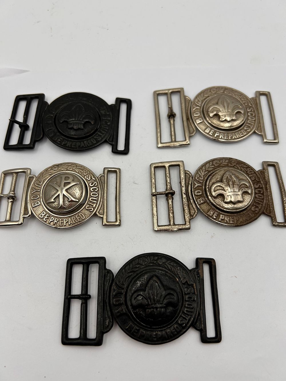 Lot 244: A Group of Five Vintage Boy Scouts Belt Buckles