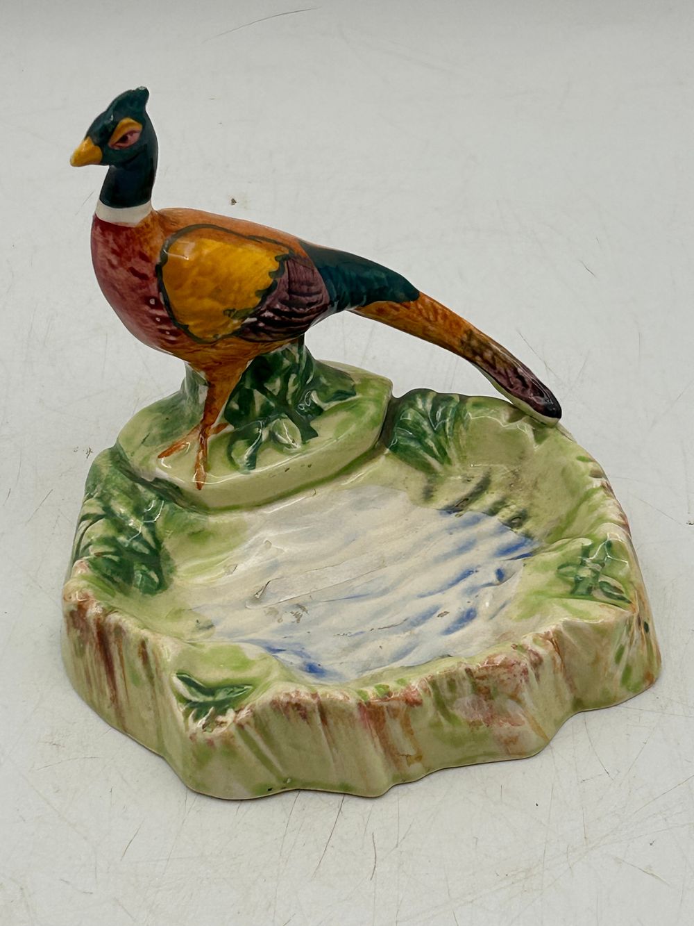 Lot 580: A Beswick Pheasant Ashtray, England