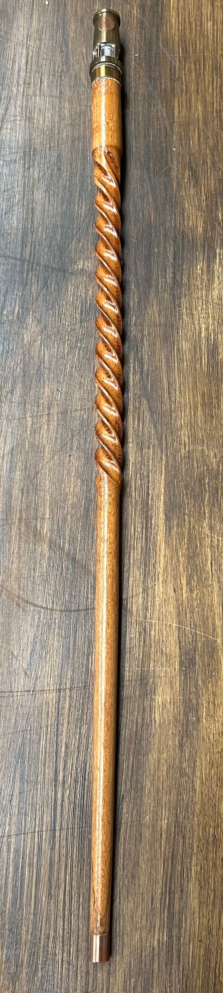 Lot 619: Decorative Walking Stick with Miner's Lamp Handle and Spiral Carved Shaft