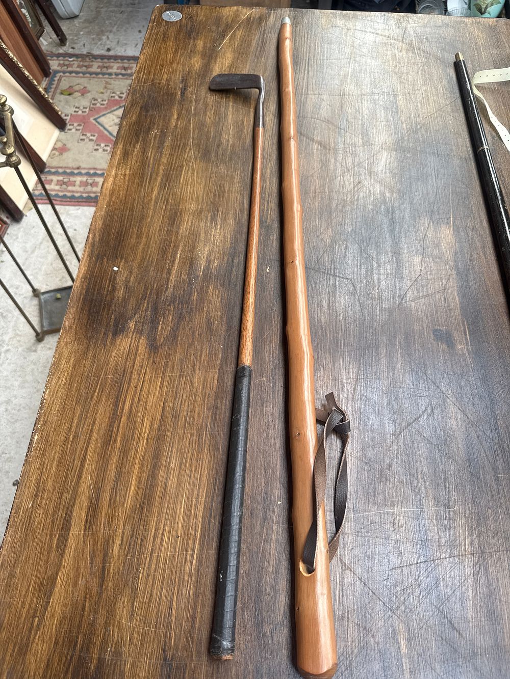 Lot 623: A J. Allan Glasgow Warranted Hand Forged Antique Golf Putter and a Rustic Walking Stick