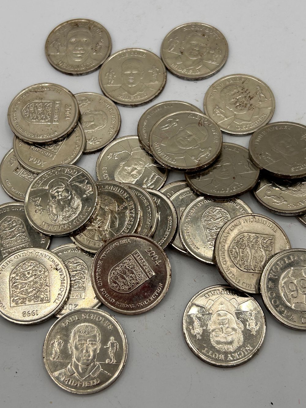 Lot 309: A Collection of Silver-Colored Metallic Commemorative Medals, 1990-2004, including 'The Official England Squad Medal Collection' and William Shakespeare