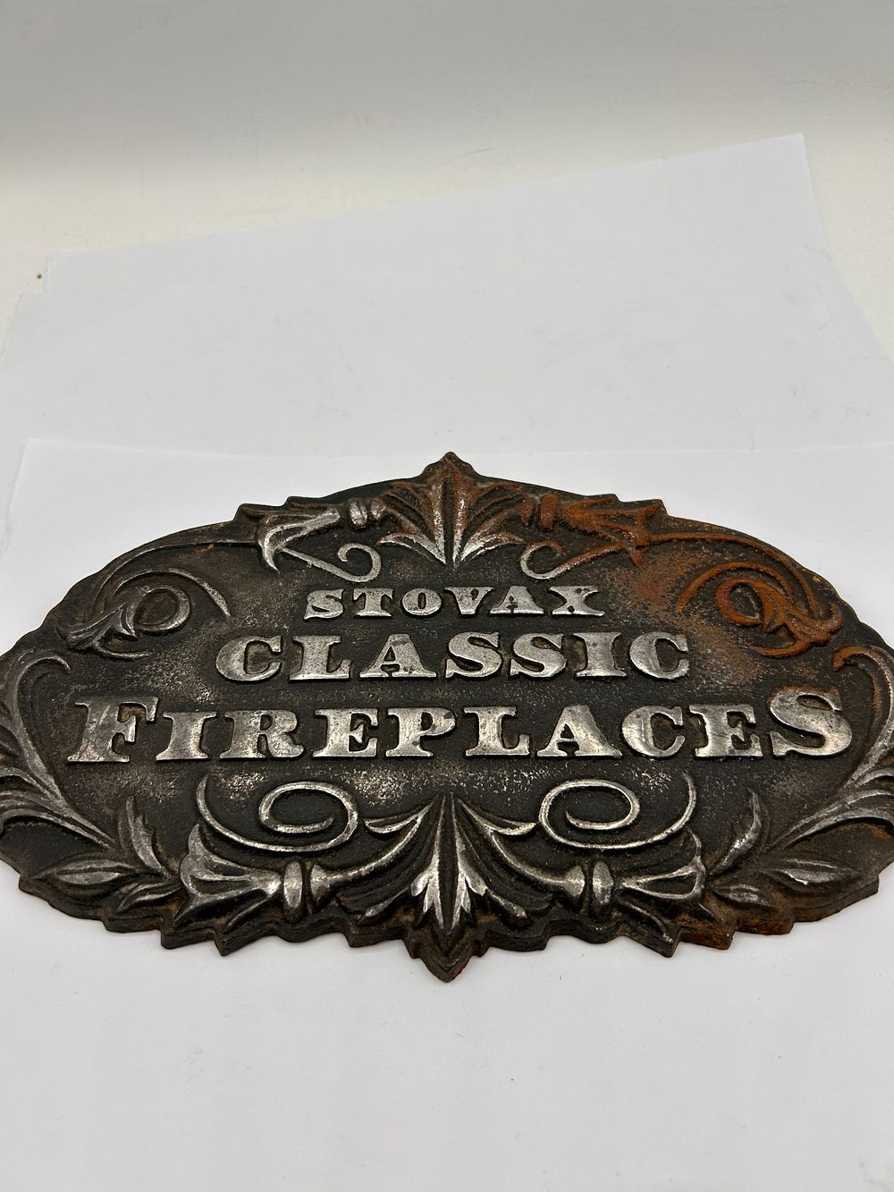 Lot 315: Ornate Cast Iron 'STOVAX CLASSIC FIREPLACES' Advertising Plaque