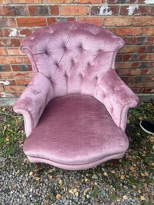 An Upholstered French Provincial Style Tufted Pink Velvet Armchair. An upholstered armchair 