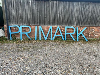 A Set of Seven Large Light Up 'PRIMARK' Letters, 40 Inches Tall. A set of seven individual 