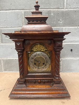 Junghans German Mantel Clock, 15 x 24 inches. A Junghans German mantel clock, featuring a 