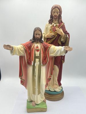 A Pair of Painted Plaster Sacred Heart of Jesus Statues, the tallest 15”. This lot comprises two 