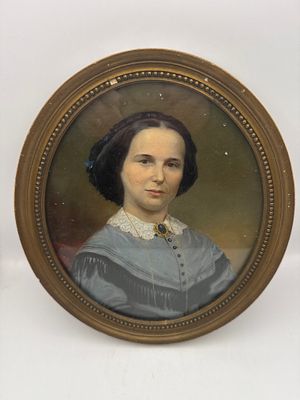 19th Century Oval Oil Portrait of a Young Lady in a Gilded Frame. An oval portrait painting 