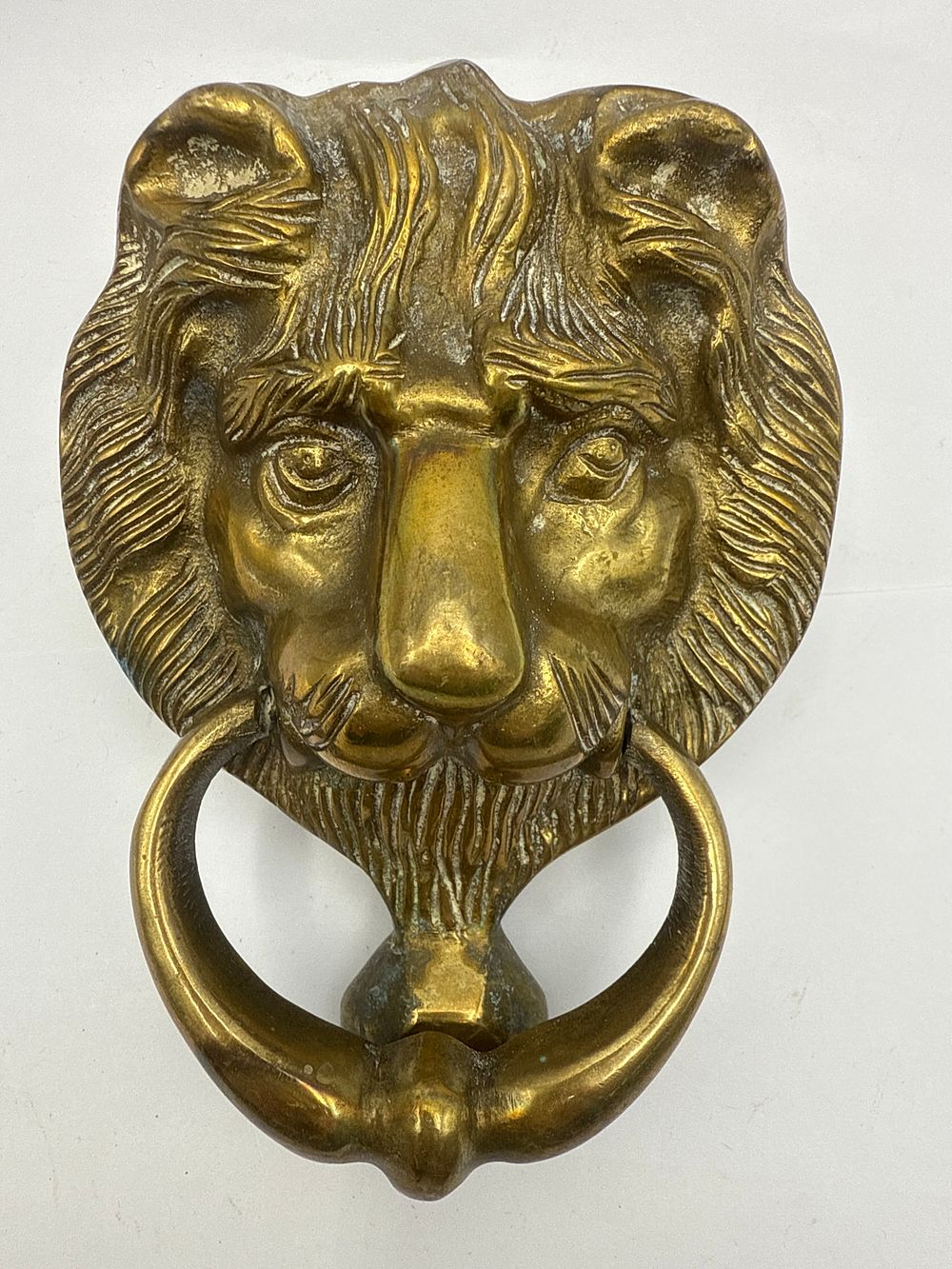 Lot 49: A 6-Inch Brass Lion Head Door Knocker
