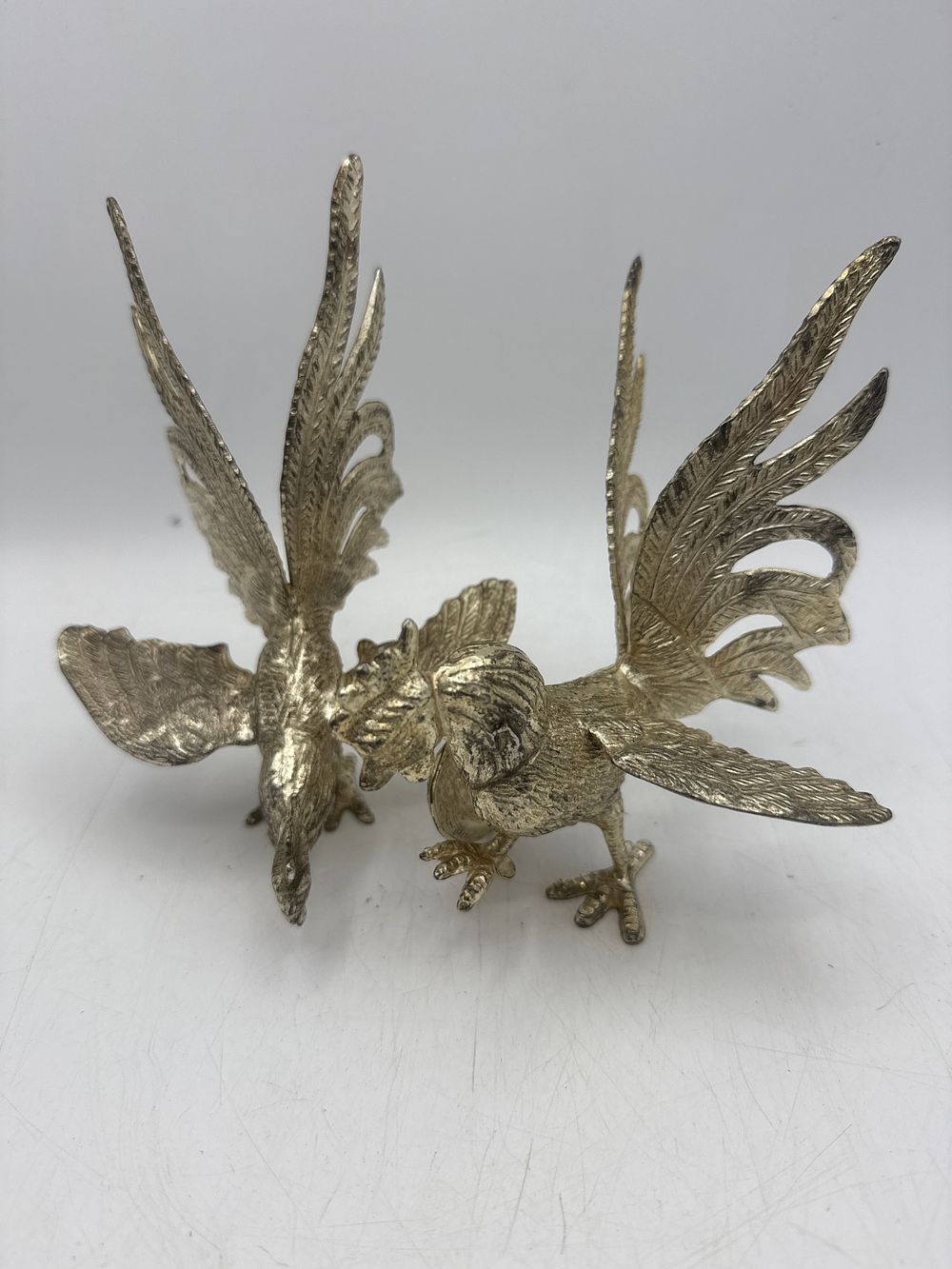 Lot 407: A Pair of Vintage Silver-Plated Fighting Roosters