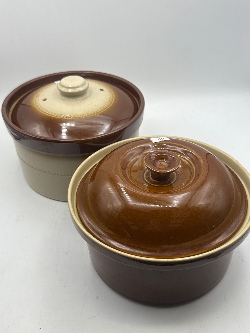 Lot 409: A Pair of Pearsons of Chesterfield, England Brown Glazed Stoneware Casseroles with Lids, 8” Diameter