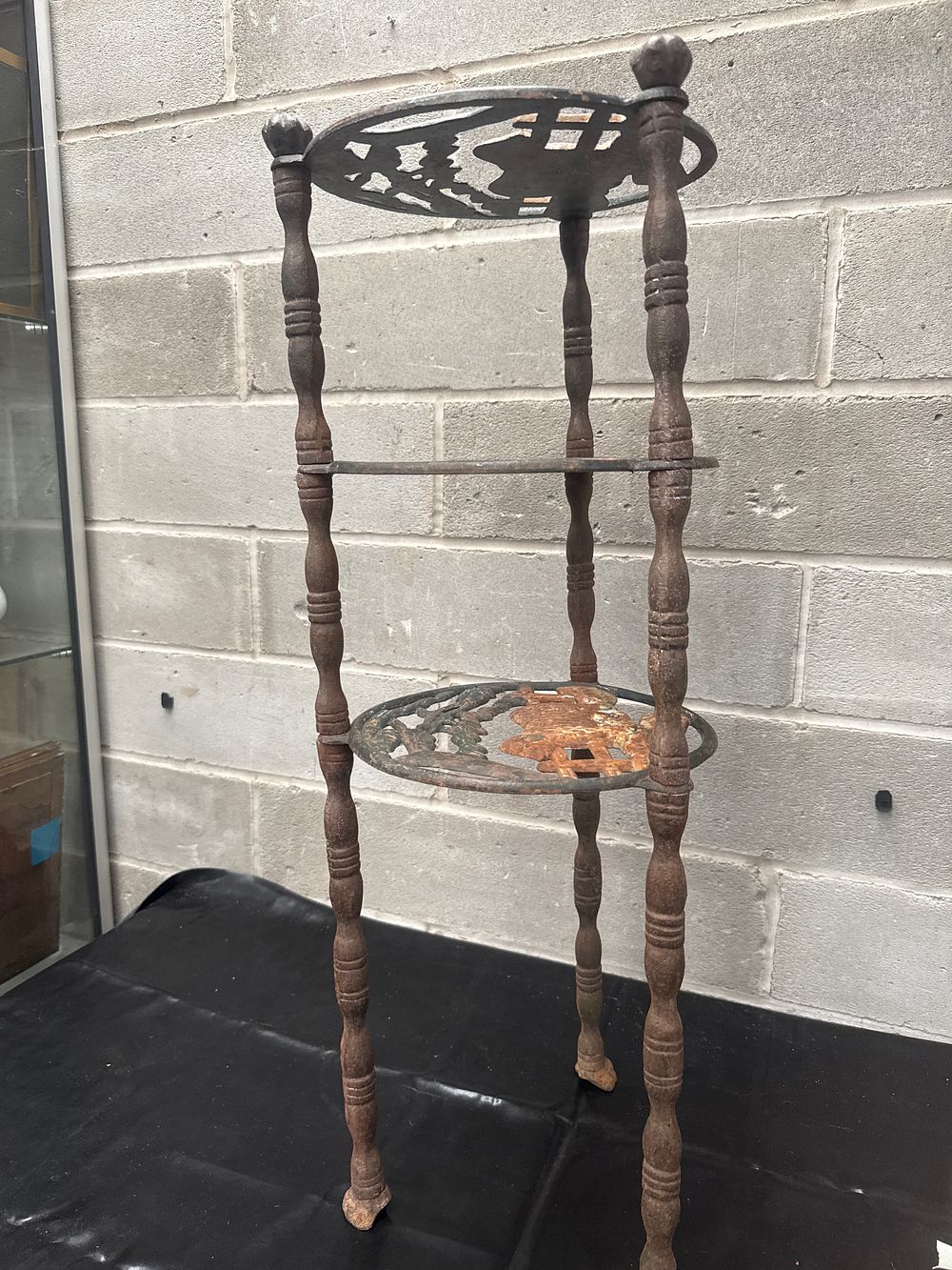 Lot 423: A Victorian Style Cast Iron Three-Tier Figural Plant Stand, 29” Tall